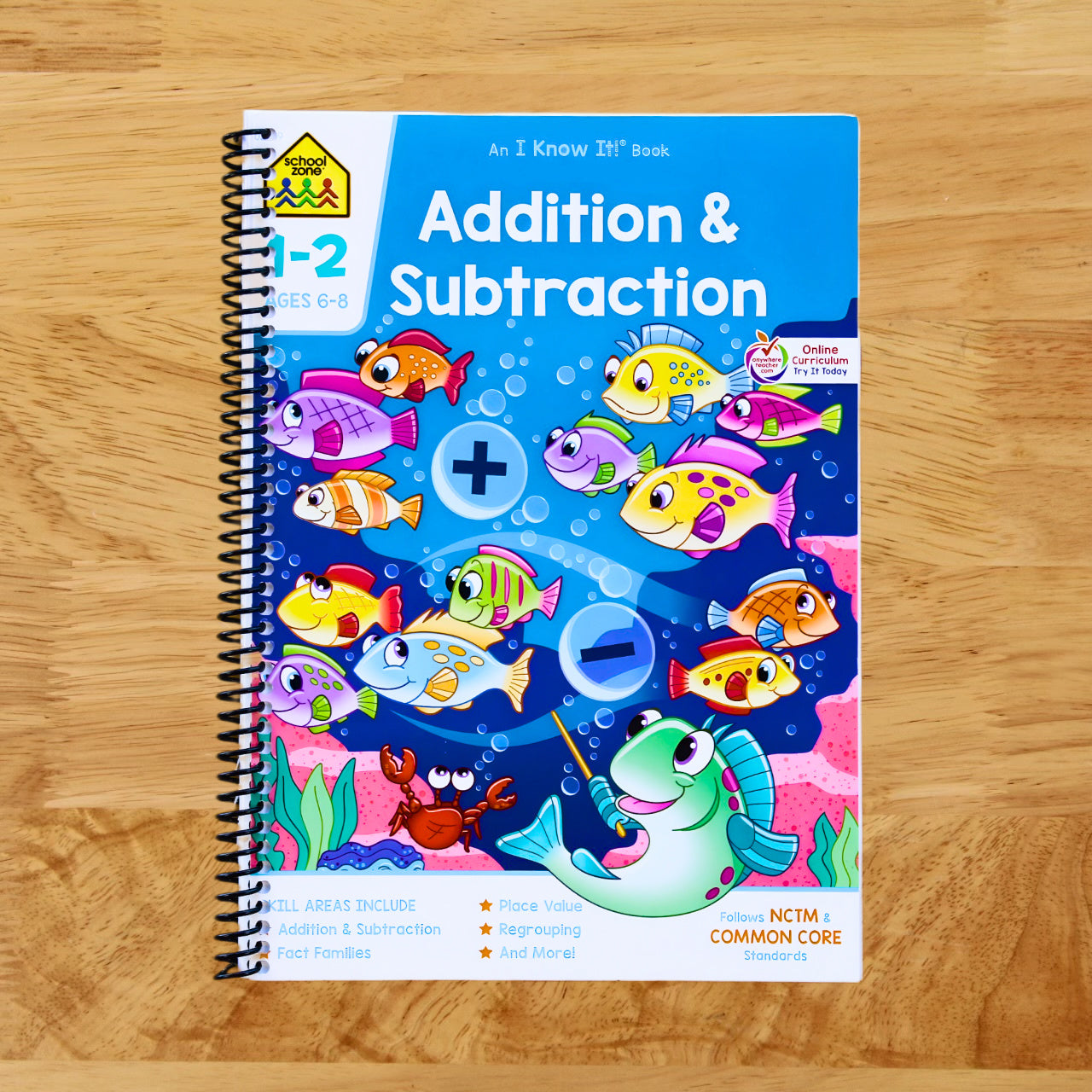 School Zone - Addition & Subtraction Workbook - 64 Pages, Ages 6 to 8, 1st & 2nd Grade Math, Place Value, Regrouping, Fact Tables, and More (Spiral bound)